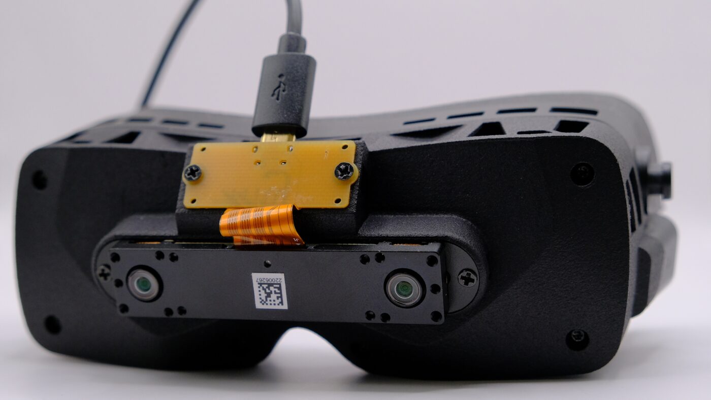 BSB-SLAM sensor board mounted on the front of a Bigscreen Beyond headset